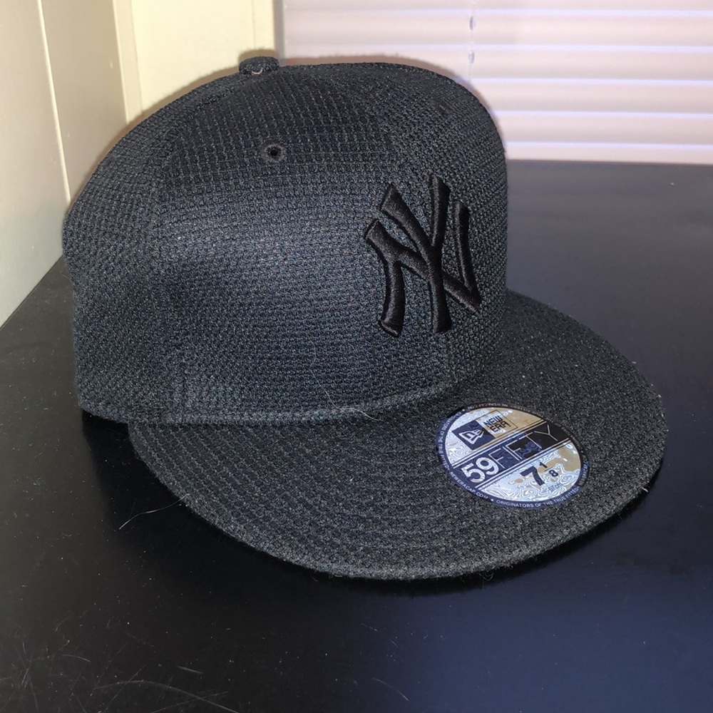Black crochet style fitted hat